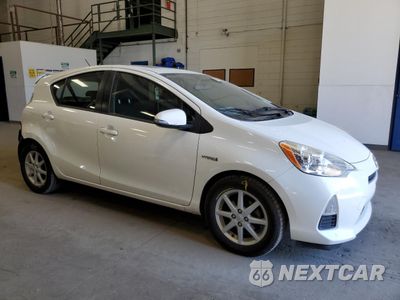 Czwarte zdjęcie samochodu z boku: 2012 TOYOTA PRIUS C VIN:JTDKDTB35C1009488 - miniatura