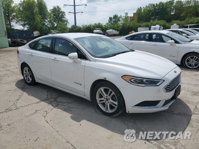 Czwarte zdjęcie samochodu z boku: 2018 FORD FUSION SE HYBRID VIN:3FA6P0LU6JR118856 - miniatura
