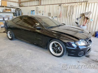 Czwarte zdjęcie samochodu z boku: 2005 PONTIAC GTO VIN:6G2VX12U65L434279 - miniatura