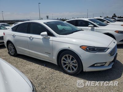 Czwarte zdjęcie samochodu z boku: 2017 FORD FUSION SE HYBRID VIN:3FA6P0LU0HR409301 - miniatura