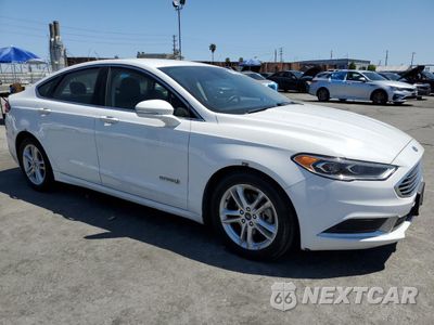 Czwarte zdjęcie samochodu z boku: 2018 FORD FUSION SE HYBRID VIN:3FA6P0LU5JR129962 - miniatura