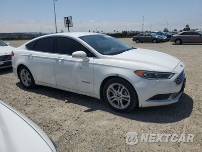 Czwarte zdjęcie samochodu z boku: 2018 FORD FUSION SE HYBRID VIN:3FA6P0LU7JR171579 - miniatura