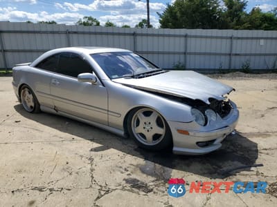 Czwarte zdjęcie samochodu z boku: 2001 MERCEDES-BENZ CL 500 VIN:WDBPJ75J21A015602 - miniatura