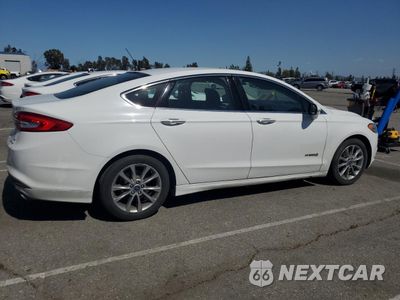 Trzecie zdjęcie samochodu z tyłu: 2017 FORD FUSION SE HYBRID VIN:3FA6P0LU7HR409330 - miniatura