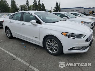 Czwarte zdjęcie samochodu z boku: 2017 FORD FUSION SE HYBRID VIN:3FA6P0LU2HR409154 - miniatura