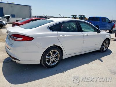 Trzecie zdjęcie samochodu z tyłu: 2018 FORD FUSION SE HYBRID VIN:3FA6P0LU2JR178469 - miniatura