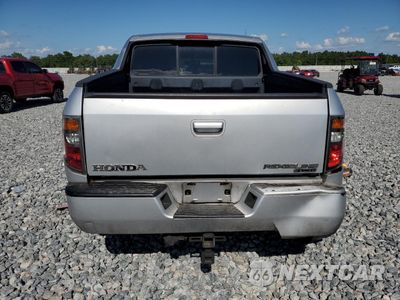 Zdjęcie 6 z 14 samochodu: 2007 HONDA RIDGELINE RTX VIN:2HJYK16317H501503 - miniatura