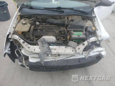 Zdjęcie 11 z 13 samochodu: 2003 FORD FOCUS SE VIN:1FAFP36333W242345 - miniatura