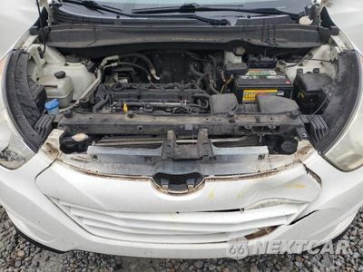 Zdjęcie 11 z 13 samochodu: 2010 HYUNDAI TUCSON GLS VIN:KM8JT3AC5AU081704 - miniatura