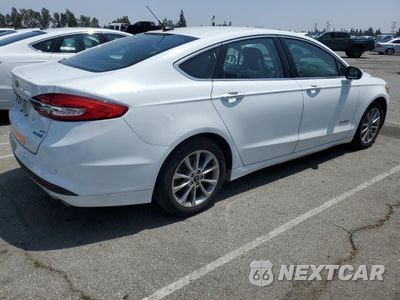 Trzecie zdjęcie samochodu z tyłu: 2017 FORD FUSION SE HYBRID VIN:3FA6P0LU8HR408946 - miniatura