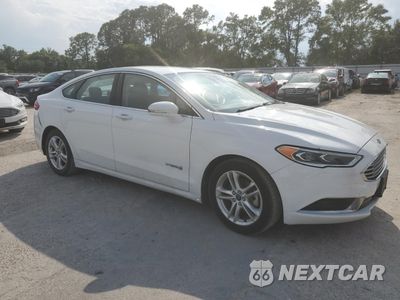 Czwarte zdjęcie samochodu z boku: 2018 FORD FUSION SE HYBRID VIN:3FA6P0LU8JR129891 - miniatura