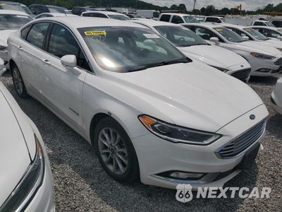 Czwarte zdjęcie samochodu z boku: 2017 FORD FUSION SE HYBRID VIN:3FA6P0LU1HR409517 - miniatura
