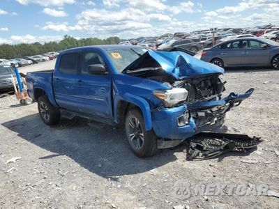 Czwarte zdjęcie samochodu z boku: 2018 TOYOTA TACOMA DOUBLE CAB VIN:3TMCZ5AN6JM174437 - miniatura