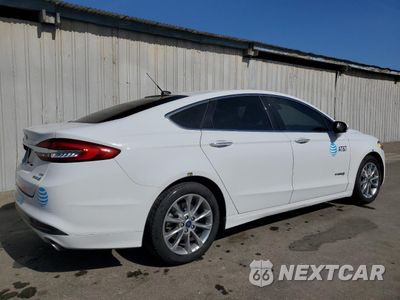 Trzecie zdjęcie samochodu z tyłu: 2017 FORD FUSION SE HYBRID VIN:3FA6P0LU9HR409197 - miniatura
