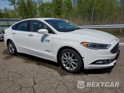 Czwarte zdjęcie samochodu z boku: 2017 FORD FUSION SE HYBRID VIN:3FA6P0LU0HR359645 - miniatura