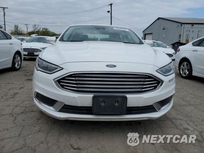 Piąte zdjęcie samochodu w środku: 2018 FORD FUSION SE HYBRID VIN:3FA6P0LU2JR172087 - miniatura