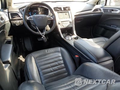 Zdjęcie 8 z 13 samochodu: 2017 FORD FUSION SE HYBRID VIN:3FA6P0LU5HR409486 - miniatura