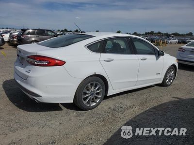 Trzecie zdjęcie samochodu z tyłu: 2017 FORD FUSION SE HYBRID VIN:3FA6P0LU6HR408931 - miniatura