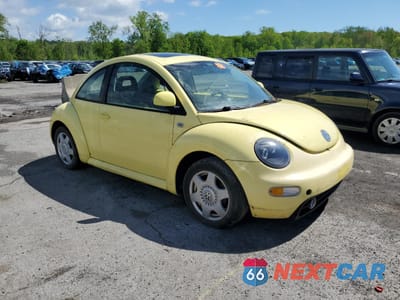 Czwarte zdjęcie samochodu z boku: 1999 VOLKSWAGEN NEW BEETLE GLS VIN:3VWCC21C8XM447978 - miniatura