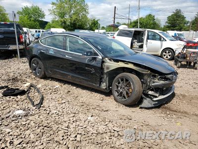 Czwarte zdjęcie samochodu z boku: 2019 TESLA MODEL 3 VIN:5YJ3E1EB6KF384465 - miniatura