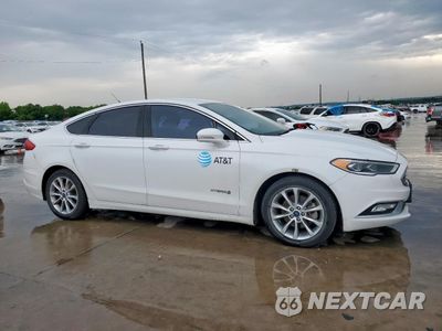 Czwarte zdjęcie samochodu z boku: 2017 FORD FUSION SE HYBRID VIN:3FA6P0LU6HR409092 - miniatura