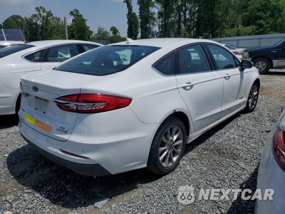 Trzecie zdjęcie samochodu z tyłu: 2019 FORD FUSION SE VIN:3FA6P0LU1KR124906 - miniatura