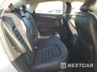 Zdjęcie 10 z 13 samochodu: 2017 FORD FUSION SE HYBRID VIN:3FA6P0LUXHR409449 - miniatura