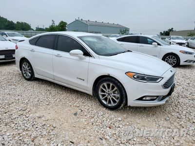 Czwarte zdjęcie samochodu z boku: 2017 FORD FUSION SE HYBRID VIN:3FA6P0LU1HR409047 - miniatura