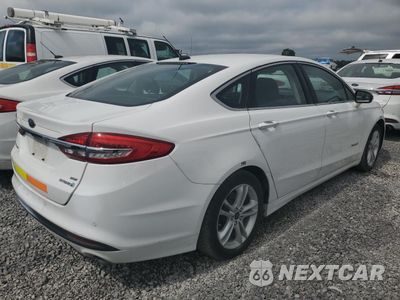 Trzecie zdjęcie samochodu z tyłu: 2018 FORD FUSION SE HYBRID VIN:3FA6P0LU3JR118782 - miniatura