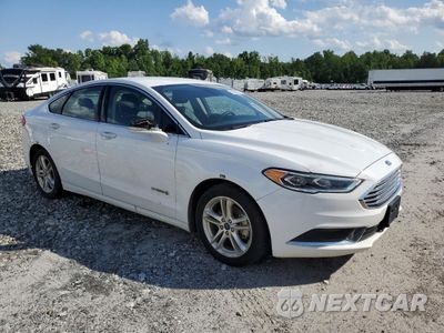 Czwarte zdjęcie samochodu z boku: 2018 FORD FUSION SE HYBRID VIN:3FA6P0LU7JR171761 - miniatura