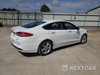 Trzecie zdjęcie samochodu z tyłu: 2017 FORD FUSION SE HYBRID VIN:3FA6P0LU5HR409231 - miniatura