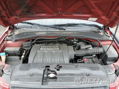 Zdjęcie 12 z 13 samochodu: 2005 HONDA PILOT EXL VIN:2HKYF18775H569897 - miniatura