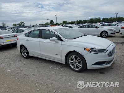 Czwarte zdjęcie samochodu z boku: 2018 FORD FUSION SE HYBRID VIN:3FA6P0LU8JR118826 - miniatura
