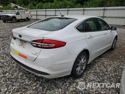 Trzecie zdjęcie samochodu z tyłu: 2017 FORD FUSION SE HYBRID VIN:3FA6P0LU5HR410041 - miniatura