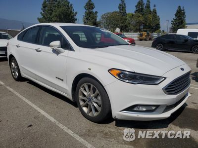 Czwarte zdjęcie samochodu z boku: 2017 FORD FUSION SE HYBRID VIN:3FA6P0LU6HR409738 - miniatura