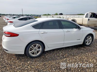 Trzecie zdjęcie samochodu z tyłu: 2018 FORD FUSION SE HYBRID VIN:3FA6P0LUXJR129813 - miniatura