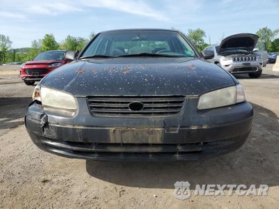Piąte zdjęcie samochodu w środku: 1997 TOYOTA CAMRY CE VIN:4T1BG22K4VU803744 - miniatura
