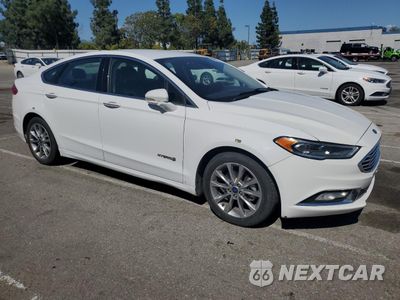 Czwarte zdjęcie samochodu z boku: 2017 FORD FUSION SE HYBRID VIN:3FA6P0LU7HR409733 - miniatura