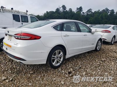 Trzecie zdjęcie samochodu z tyłu: 2018 FORD FUSION SE HYBRID VIN:3FA6P0LU8JR118633 - miniatura
