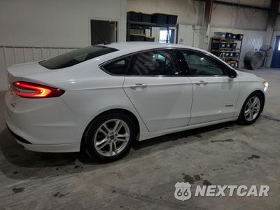 Trzecie zdjęcie samochodu z tyłu: 2018 FORD FUSION SE HYBRID VIN:3FA6P0LU7JR129848 - miniatura