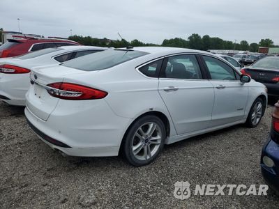Trzecie zdjęcie samochodu z tyłu: 2018 FORD FUSION SE HYBRID VIN:3FA6P0LU1JR172016 - miniatura