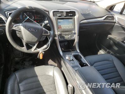 Zdjęcie 8 z 12 samochodu: 2017 FORD FUSION SE HYBRID VIN:3FA6P0LU3HR409650 - miniatura