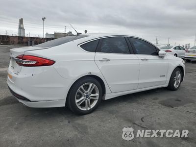 Trzecie zdjęcie samochodu z tyłu: 2018 FORD FUSION SE HYBRID VIN:3FA6P0LU9JR118673 - miniatura