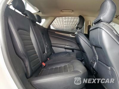 Zdjęcie 10 z 13 samochodu: 2017 FORD FUSION SE HYBRID VIN:3FA6P0LU2HR408974 - miniatura