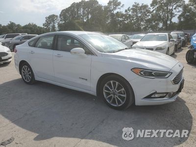 Czwarte zdjęcie samochodu z boku: 2017 FORD FUSION SE HYBRID VIN:3FA6P0LU2HR409574 - miniatura