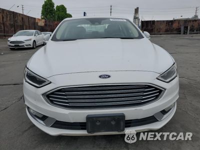 Piąte zdjęcie samochodu w środku: 2017 FORD FUSION SE HYBRID VIN:3FA6P0LU9HR409765 - miniatura