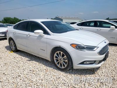 Czwarte zdjęcie samochodu z boku: 2017 FORD FUSION SE HYBRID VIN:3FA6P0LU2HR409039 - miniatura