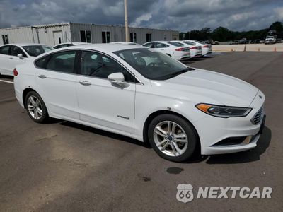 Czwarte zdjęcie samochodu z boku: 2018 FORD FUSION SE HYBRID VIN:3FA6P0LU5JR281904 - miniatura
