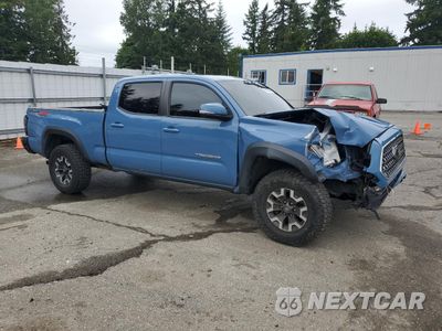 Czwarte zdjęcie samochodu z boku: 2019 TOYOTA TACOMA DOUBLE CAB VIN:3TMDZ5BN0KM064374 - miniatura