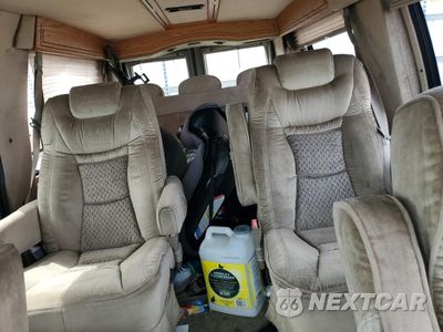 Zdjęcie 10 z 13 samochodu: 2001 FORD ECONOLINE E150 VAN VIN:1FDRE14W41HB03000 - miniatura